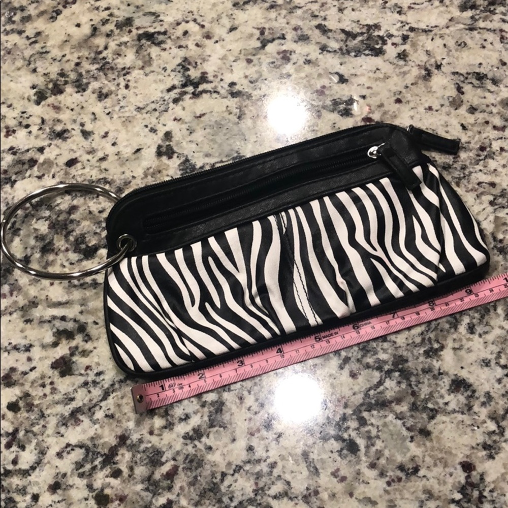 Xhilararion Zebra clutch